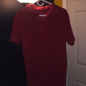 Short sleeved collard shirt.